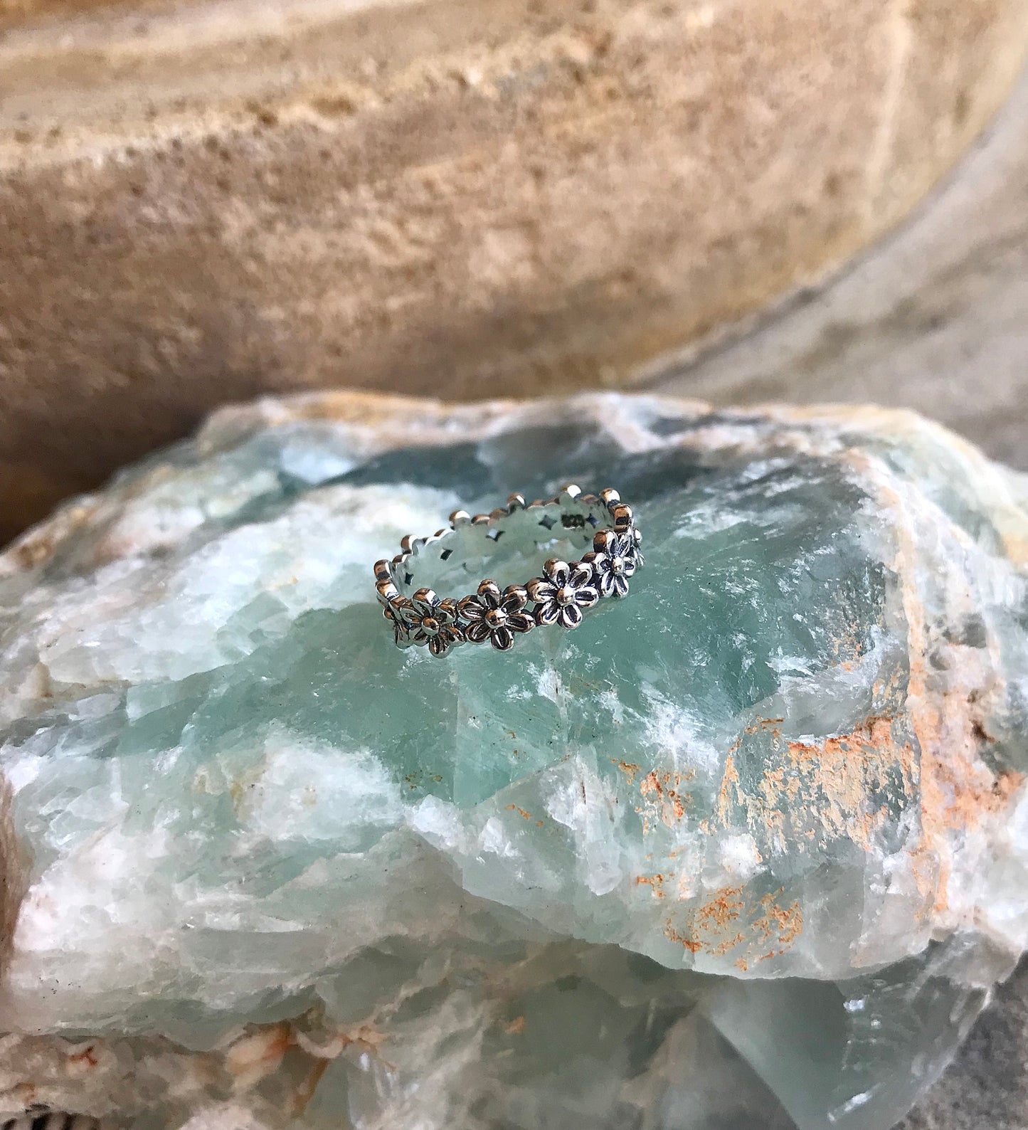 Sterling Silver Row of Flowers Ring